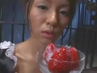 Beautiful Asian teen made eats strawberries with sperm cover